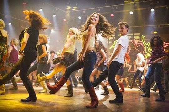 Country Line Dancing inside the Gear Head Grille & Bar